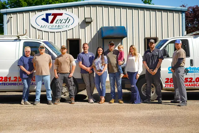 The JTech Mechanical team outside the Magnolia shop